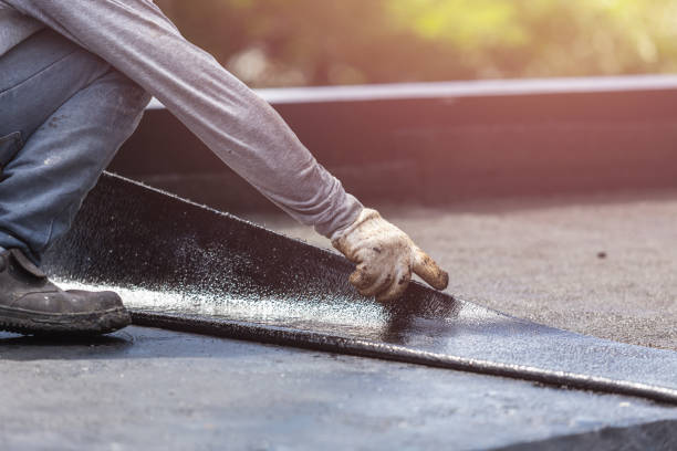 Professional Interior Drainage System technician working in Coram, NY